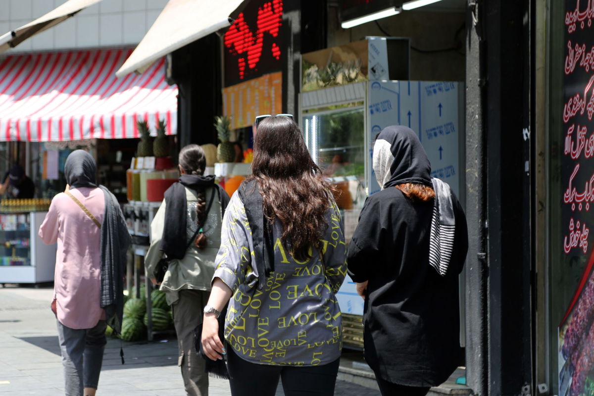 <i>Fatemeh Bahrami/Anadolu Agency/Getty Images</i><br/>Women walk on the streets of Tehran as the country's morality police resume hijab patrols.