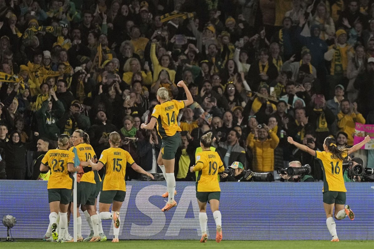 <i>Rick Rycroft/AP</i><br/>Australian players celebrate the team's opening goal against Denmark at the Women's World Cup.