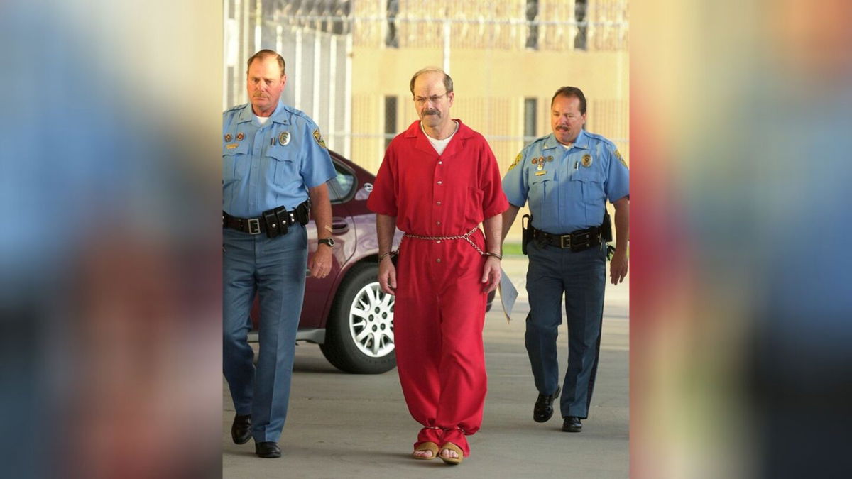 <i>Jeff Tuttle/The Eagle/AP/File</i><br/>Convicted serial killer Dennis Rader walks into the El Dorado Correctional Facilityon August 19