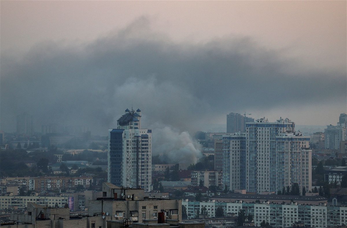 <i>Gleb Garanich/Reuters</i><br/>Smoke rises over Kyiv after a Russian bombardment on August 30.