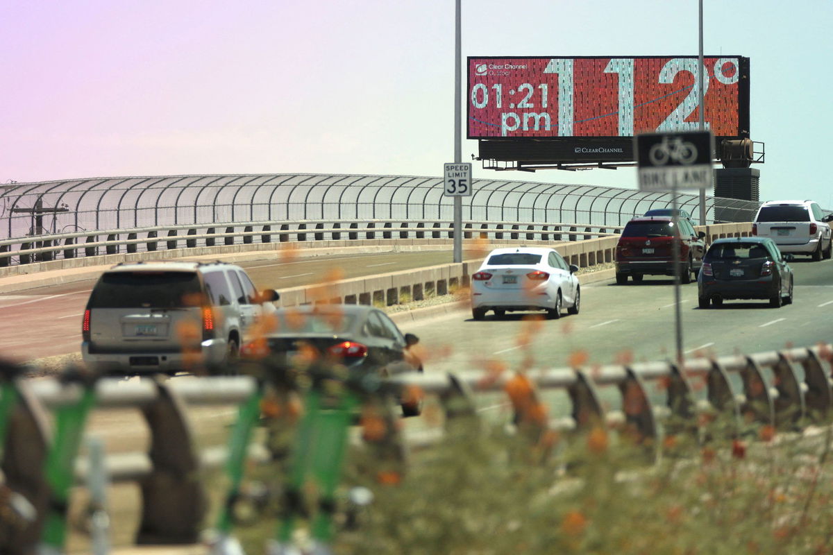 <i>Liliana Salgado/Reuters</i><br/>A billboard displays the temperature in Phoenix on July 18.