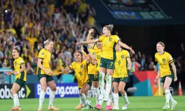 Australia's players celebrate winning on penalties in the Women's World Cup.