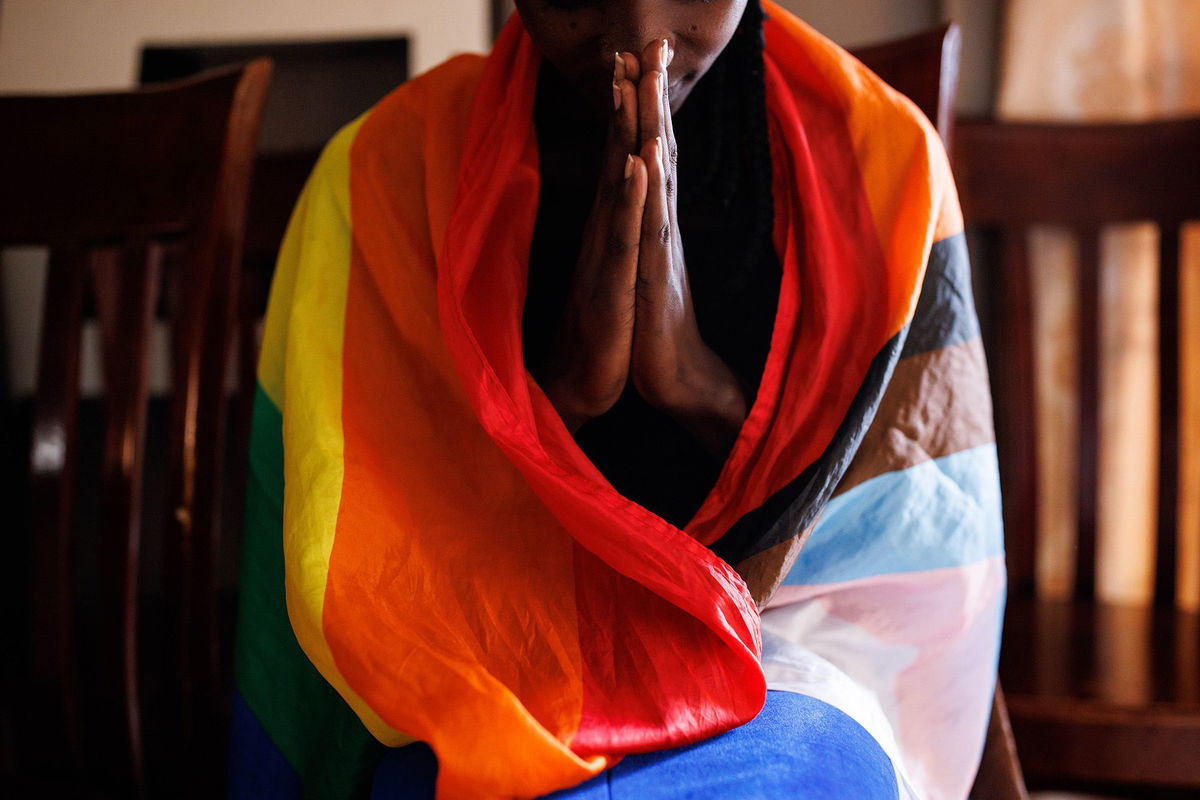 <i>Luke Dray/Getty Images</i><br/>A member of the LGBTQ community prays during an evangelical church service on April 23