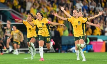 Australia players celebrate during the penalty shootout against France in the Women's World Cup quarterfinals.