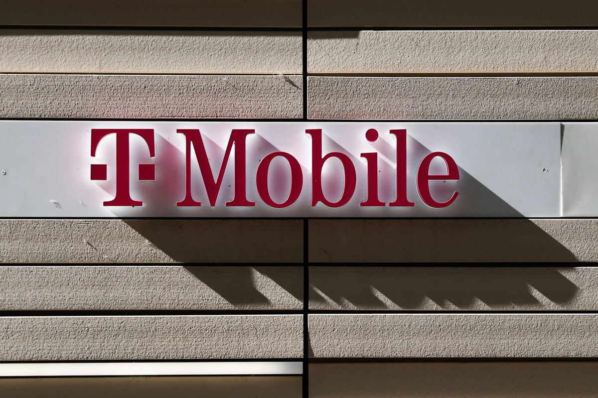 <i>Jakub Porzycki/NurPhoto/Getty Images</i><br/>T-Mobile logo is seen on the building in Chicago. T-Mobile on August 24 announced it plans to lay off 5