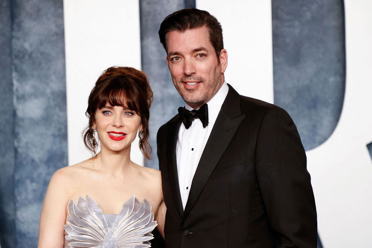 <i>Michael Tran/AFP/Getty Images</i><br/>Zooey Deschanel (left) and Jonathan Scott are pictured here in March.