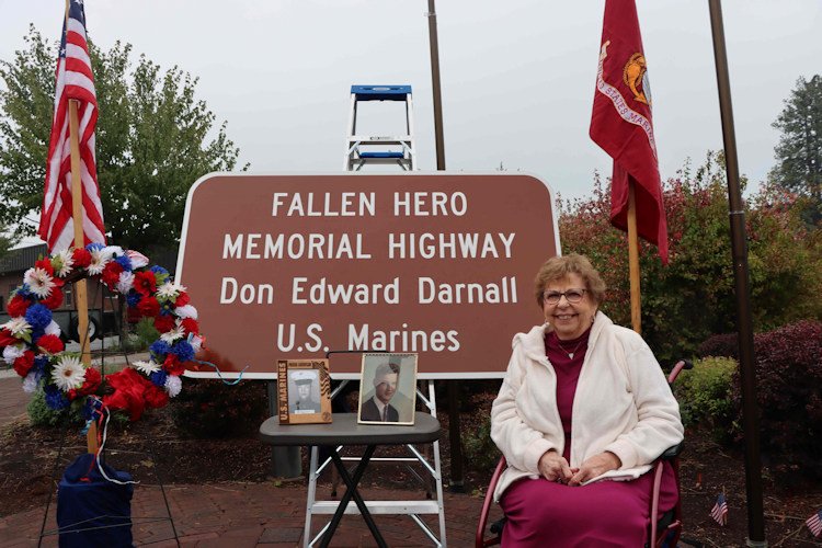 Gold Star wife Phyllis Darnall posted during Sunday ceremony with memorial highway sign honoring her late husband, killed in action in Vietnam in 1966