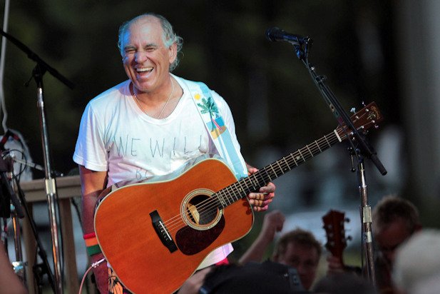 Jimmy Buffett performs at his sister's restaurant in Gulf Shores, Ala., on June 30, 2010