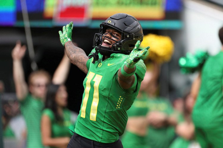 Oregon wide receiver Troy Franklin celebrates after scoring a touchdown against Colorado during the first half of Saturday's game in Eugene