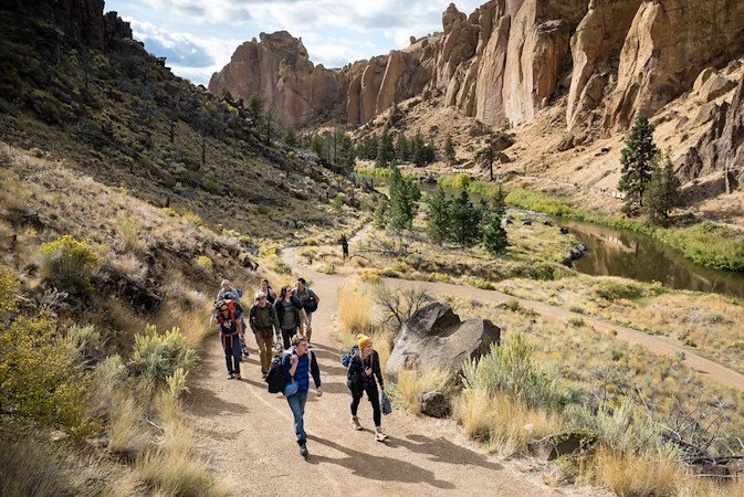 OSU-Cascades students and trip leaders hike out after rock climbing during the Headwaters Central Oregon Experience Trip at Smith Rock State Park  in September 2019