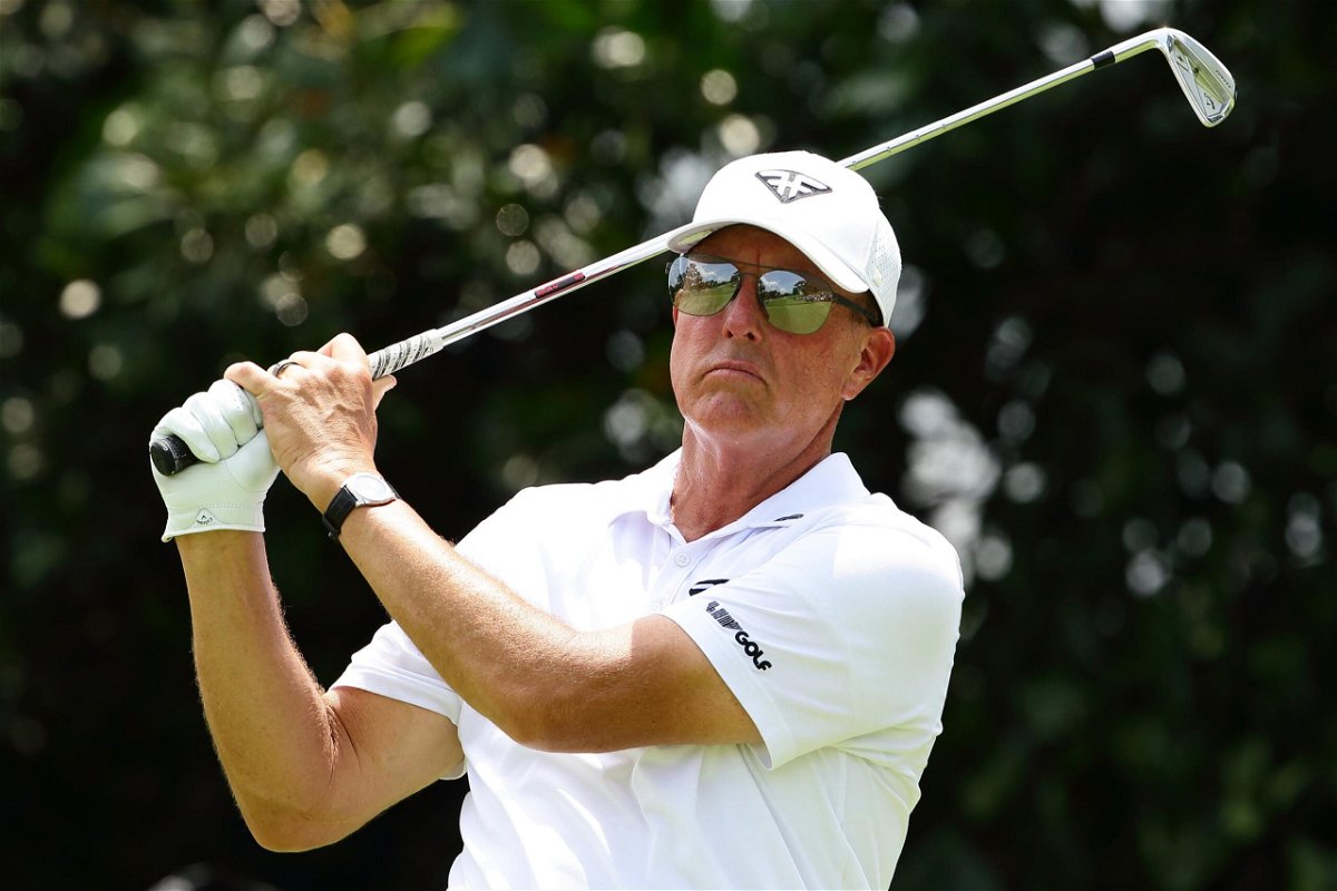 <i>Suhaimi Abdullah/Getty Images/File</i><br/>Phil Mickelson watches a shot during day one of the LIV Golf Invitational at Sentosa Golf Club in Singapore in April. Mickelson has opened up about his gambling addiction