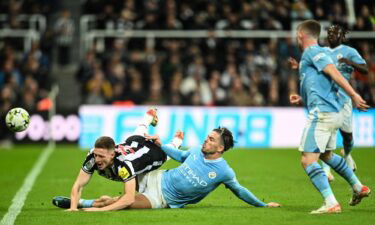 Jack Grealish (center) vies for possession with Newcastle's Elliot Anderson.