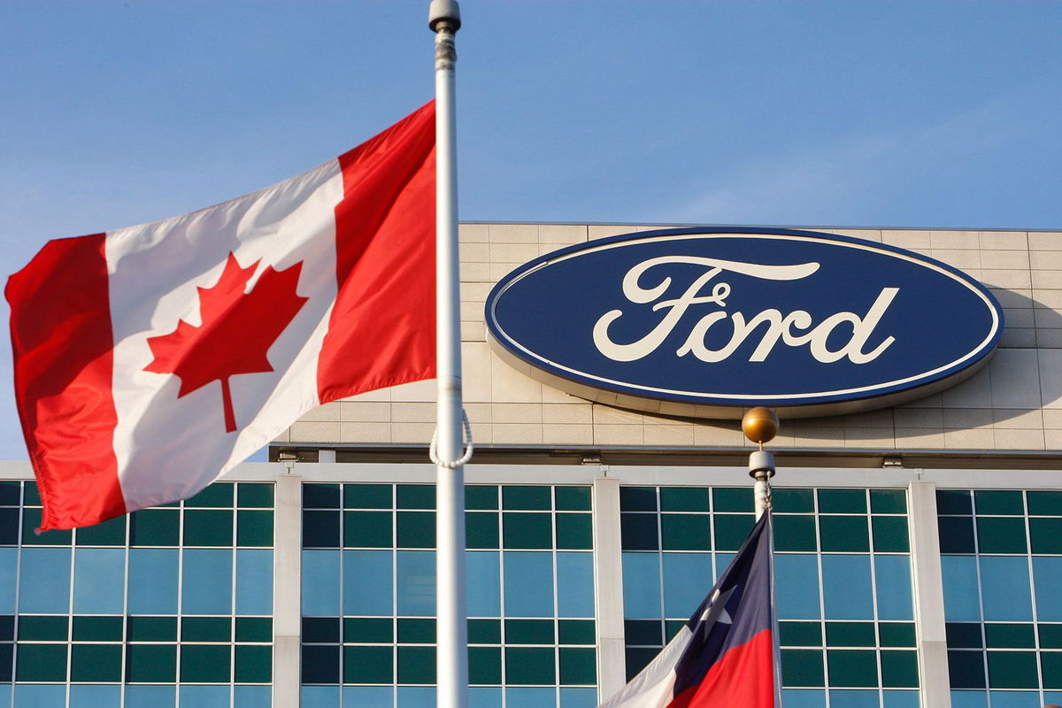 <i>Carlos Osorio/AP/FILE</i><br/>The Ford logo is seen on the automaker's headquarters in October 2009 in Dearborn