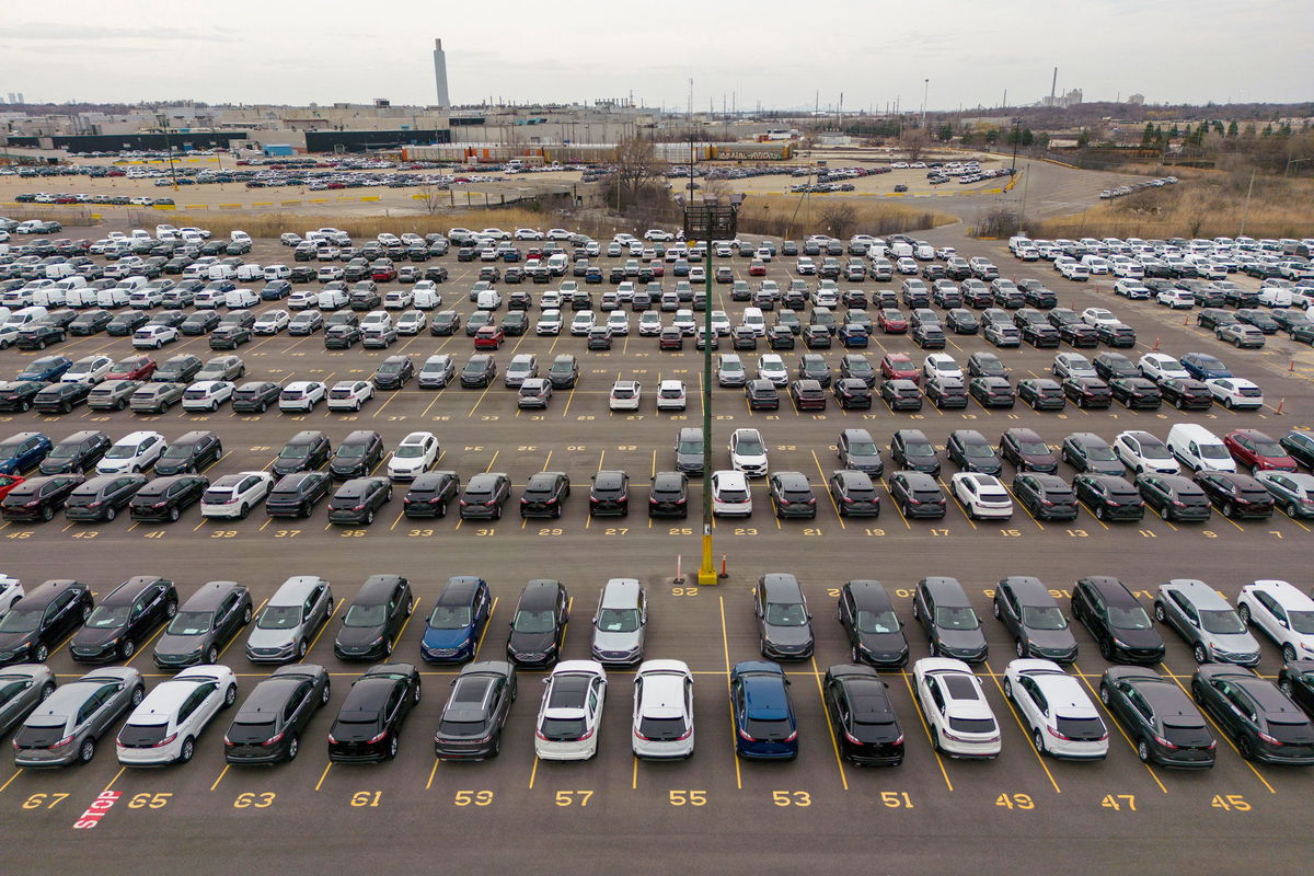 <i>Carlos Osorio/Reuters</i><br/>Recently manufactured vehicles are parked awaiting shipment near Ford's Oakville Assembly Plant in Oakville