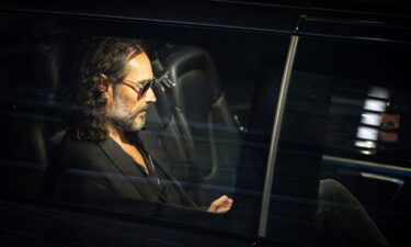Russell Brand leaves the Troubabour Wembley Park theater in northwest London after performing a comedy set on Saturday