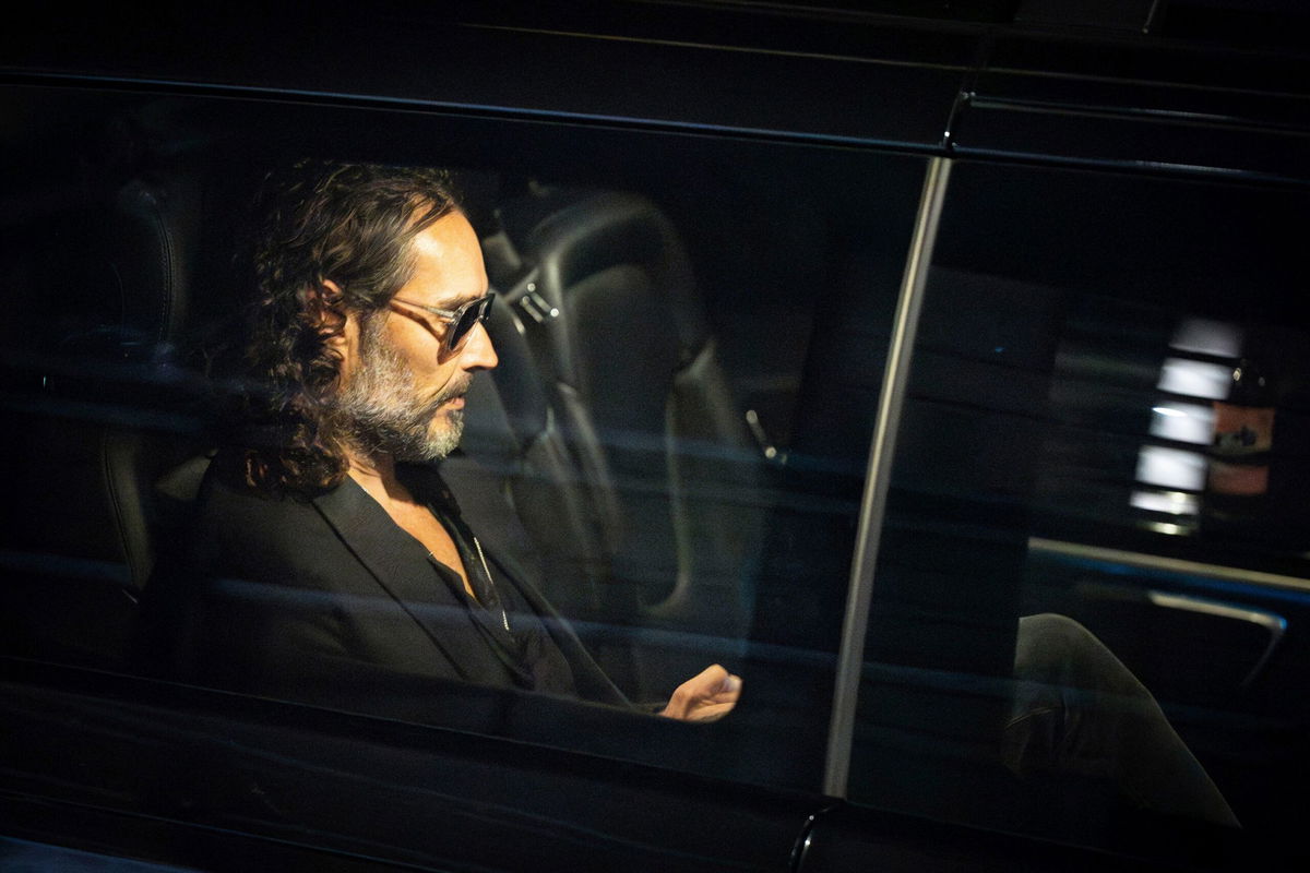 <i>James Manning/PA/AP</i><br/>Russell Brand leaves the Troubabour Wembley Park theater in northwest London after performing a comedy set on Saturday