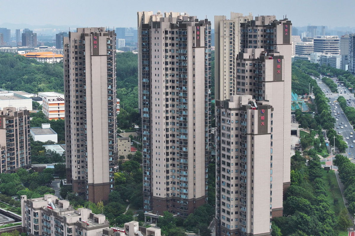 <i>Sttringer/AFP/Getty Images</i><br/>The Evergrande logo is seen on residential buildings in Nanjing