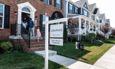 Prospective home buyers leave a property for sale during an Open House in a neighborhood in Clarksburg