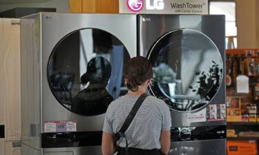 A customer looks at LG washing machines and dryers at a RC Willey home furnishings store in Draper