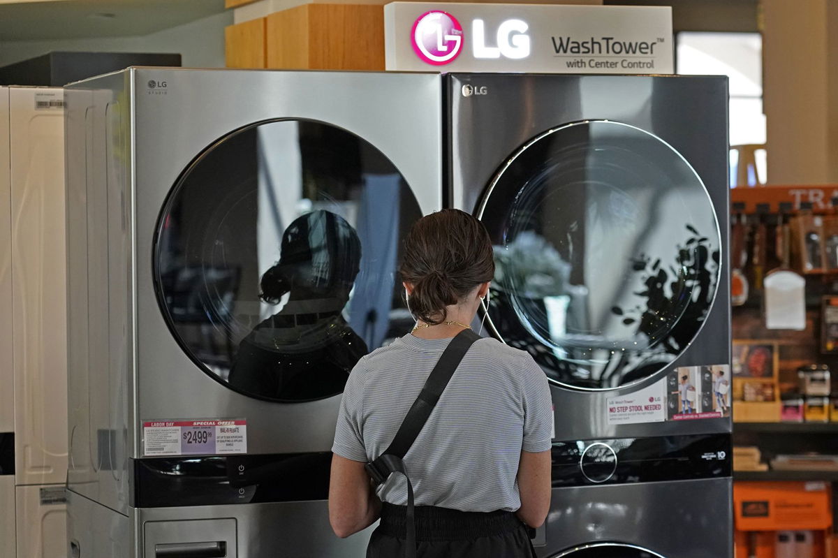 <i>George Frey/Bloomberg/Getty Images</i><br/>A customer looks at LG washing machines and dryers at a RC Willey home furnishings store in Draper