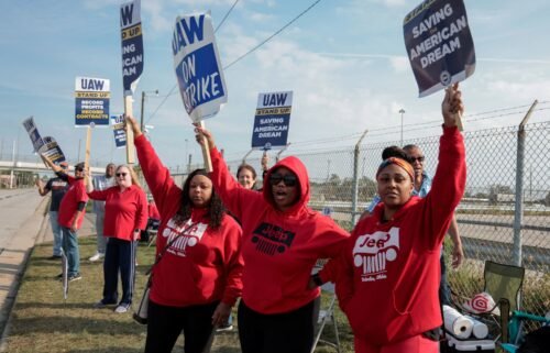 Striking United Auto Workers members picket outside the Stellantis Jeep Plant in Toledo