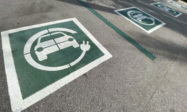 An electric vehicle charging station at Alton Shopping Center parking lot