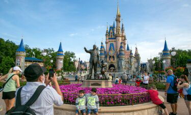 People visit the Magic Kingdom Park at Walt Disney World Resort in Lake Buena Vista in April 2022. Disney has dropped part of its lawsuit against Florida Governor Ron DeSantis to focus on free speech claims.