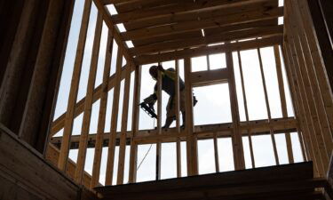 A worker builds a home in Lillington