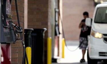 A person pumps gas on Sept. 12 in Marietta