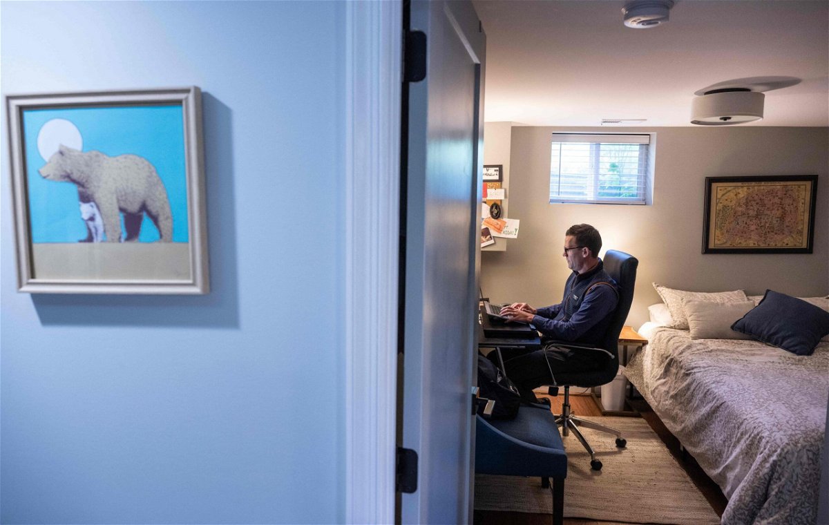 <i>Andrew Caballero-Reynolds/AFP/Getty Images</i><br/>Danny Crouch sits in his basement as he works from home in Arlington