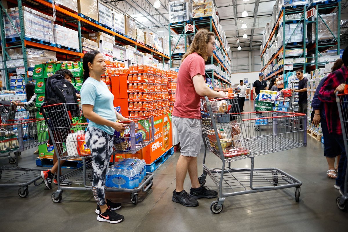 <i>Scott Olson/Getty Images</i><br/>Customers shop at a Walmart store on May 18 in Chicago