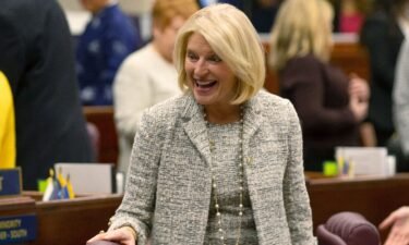 Nevada Republican Assemblywoman Heidi Kasama laughs with lawmakers in Carson City