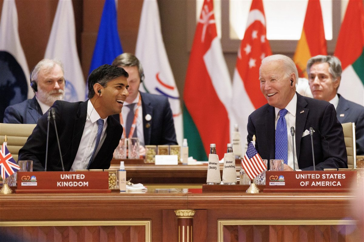 <i>Dan Kitwood/Getty Images</i><br/>British Prime Minister Rishi Sunak laughs with US President Joe Biden during the G20 Leaders' Summit on September 9 in New Delhi