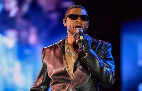 Usher performs onstage during the Lovers & Friends music festival at the Las Vegas Festival Grounds in May.