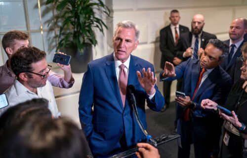 House Speaker Kevin McCarthy talks to reporters following a closed-door meeting with fellow Republicans at the Capitol in Washington on September 14.