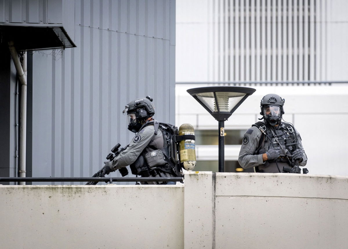 <i>Sem Van Der Wal/ANP/AFP/Getty Images</i><br/>Armed officers were photographed outside the medical center following the September 28 incident. A 32-year-old Rotterdam resident has been arrested following two shooting incidents in the Dutch city