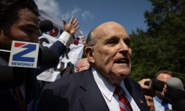 A law firm that represented Rudy Giuliani during recent years of investigations and lawsuits is now suing him for more than $1.3 million in unpaid legal fees. Giuliani is seen here in Atlanta