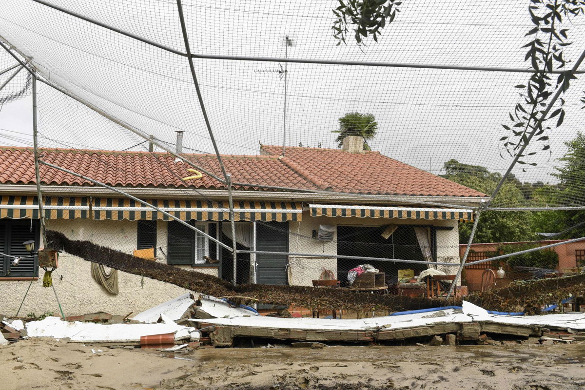 <i>OSCAR DEL POZO CANAS/AFP/Getty Images</i><br/>The storm damaged homes and left two people dead.