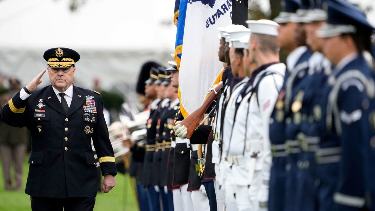 <i>Drew Angerer/Getty Images</i><br/>Outgoing Chairman of the Joint Chiefs of Staff General Mark Milley inspects the troops during an Armed Forces Farewell Tribute in his honor at Summerall Field at Joint Base Myer-Henderson Hall September 29 in Arlington