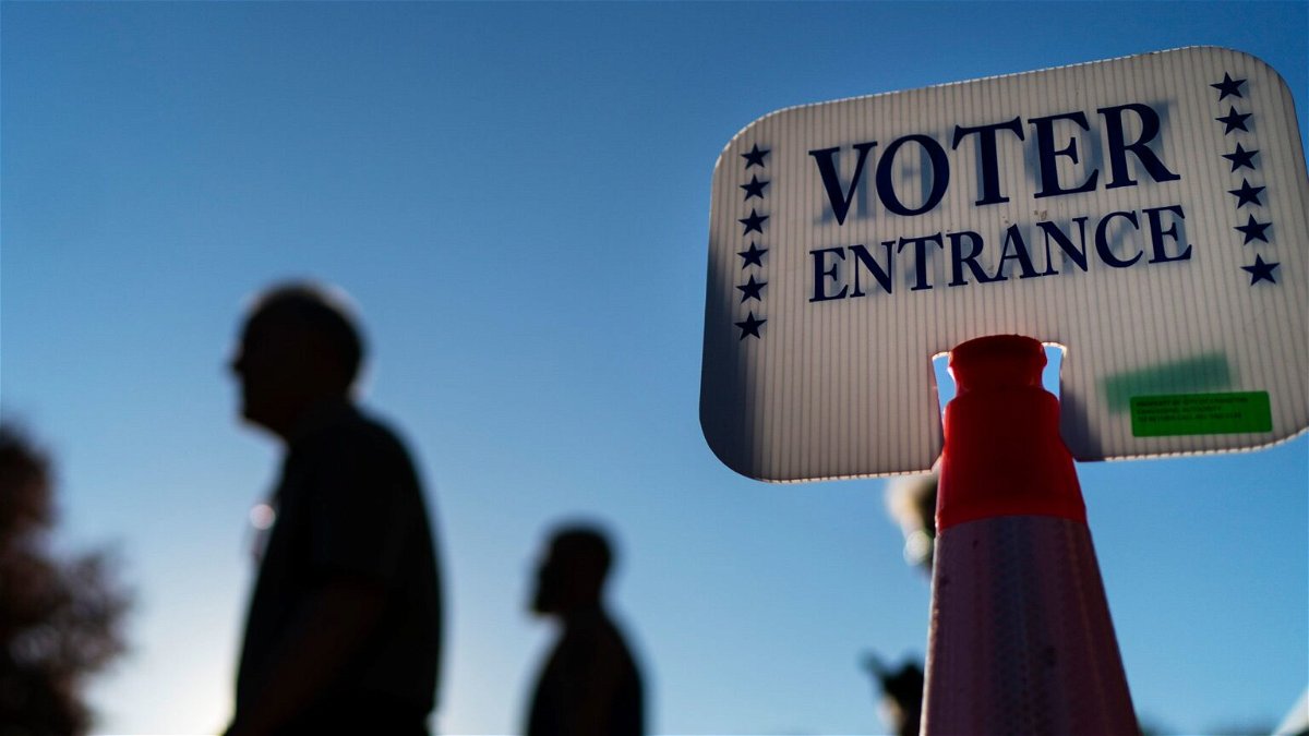 <i>David Goldman/AP</i><br/>Voters are seen outside a polling site in Warwick