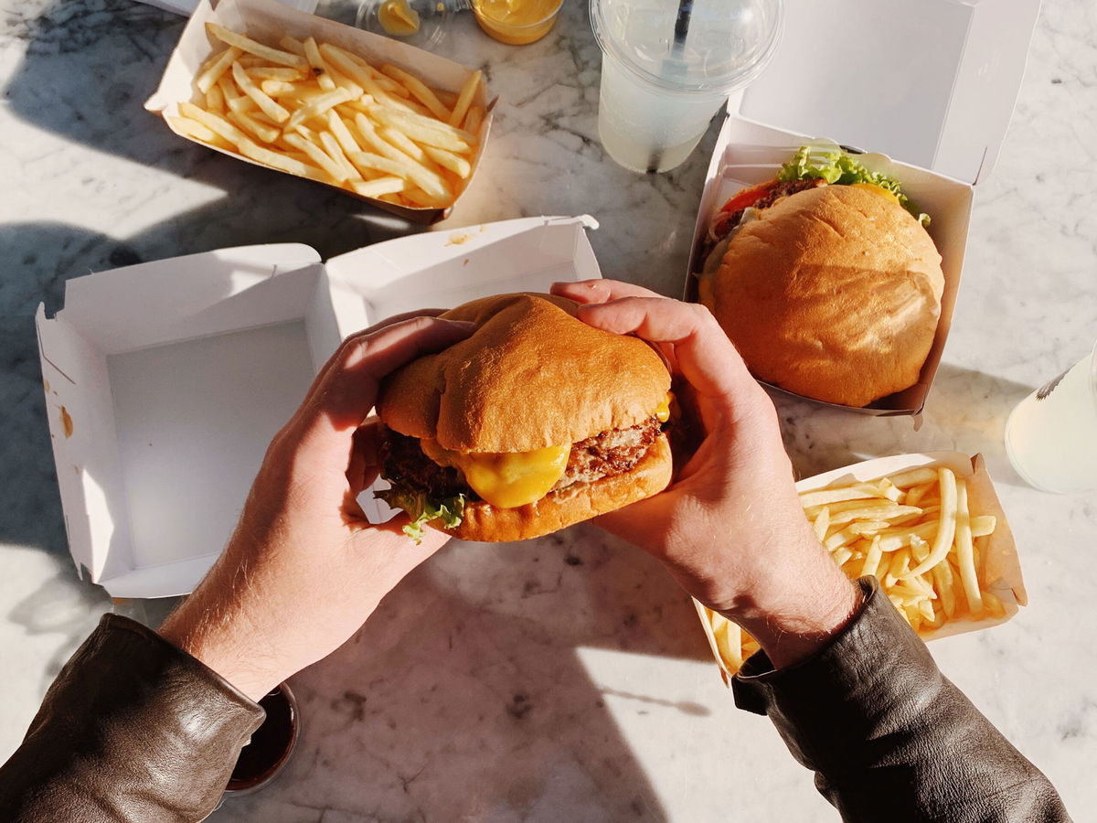 <i>Alexander Spatari/Moment RF/Getty Images</i><br/>McDonald's is giving cheeseburgers away for 50 cents and Burger King has a free cheeseburger offer on National Cheeseburger Day.