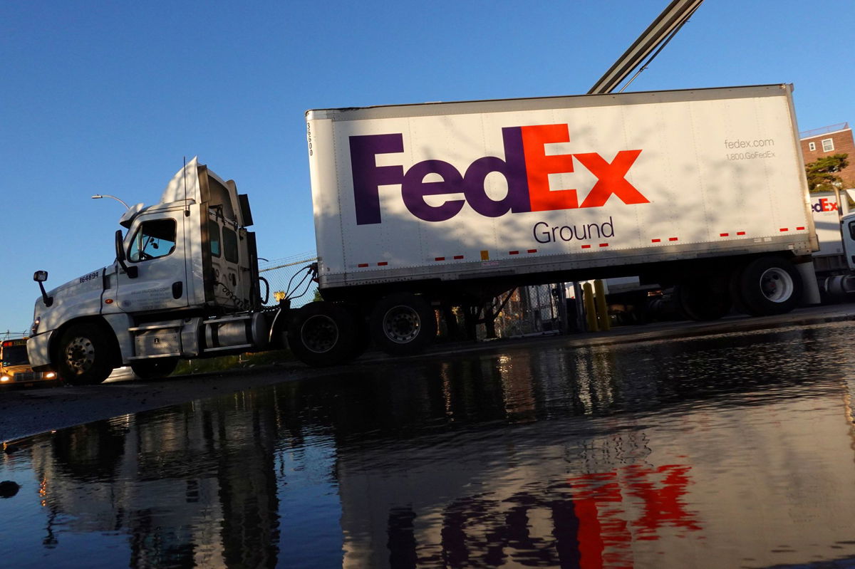<i>Andrew Kelly/Reuters</i><br/>A FedEx delivery truck exits a facility in Brooklyn