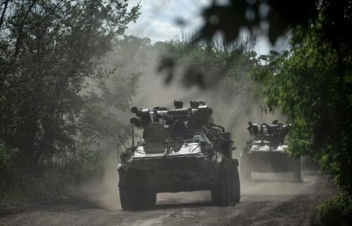 Ukrainian servicemen ride on armoured personnel carriers on a road toward Bakhmut on July 1. Fighters who had previously fought in Ukraine for the Russian mercenary group Wagner have returned to the battlefield in the east.