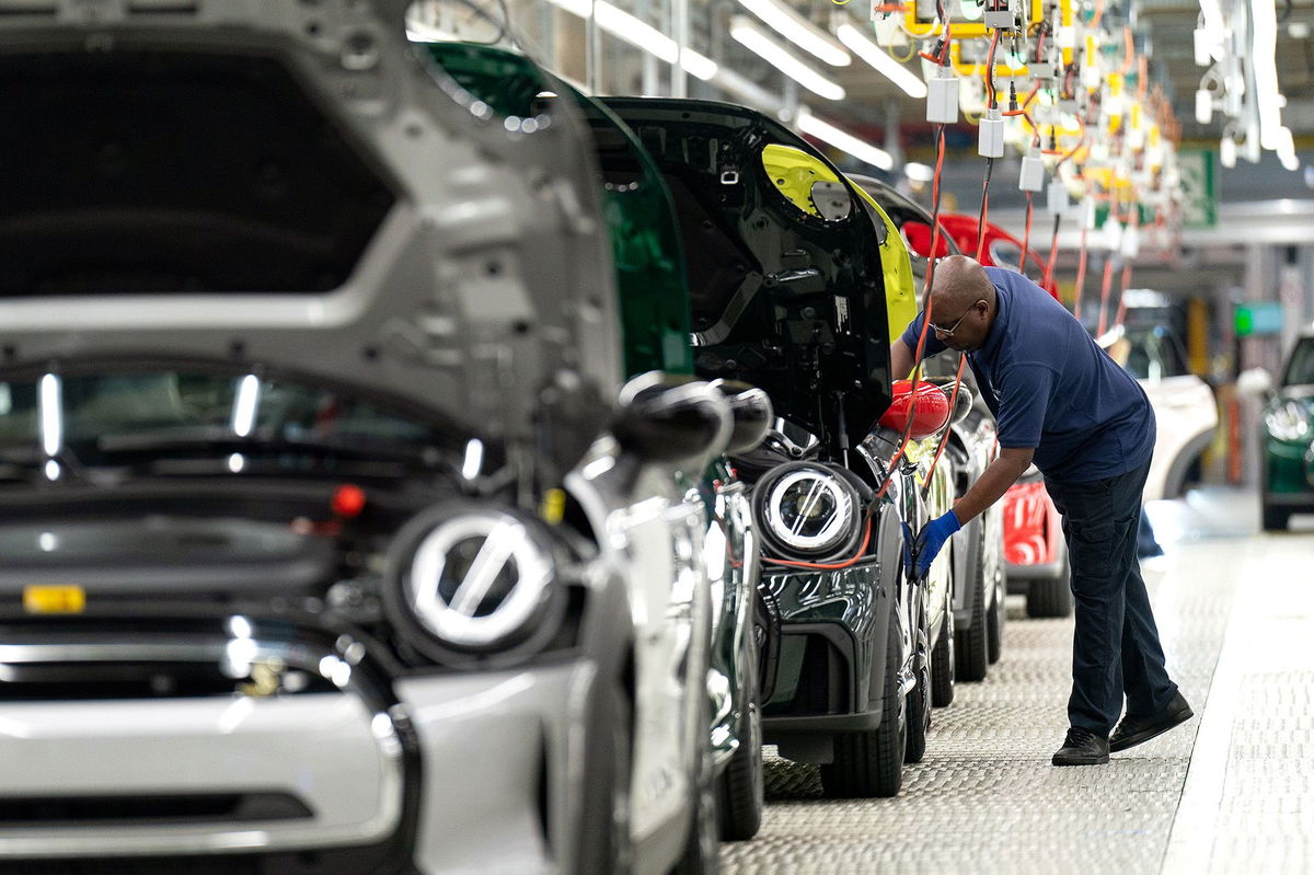 <i>Joe Giddens/PA Images/Getty Images</i><br/>Minis on the production line at the BMW Mini plant in Oxford