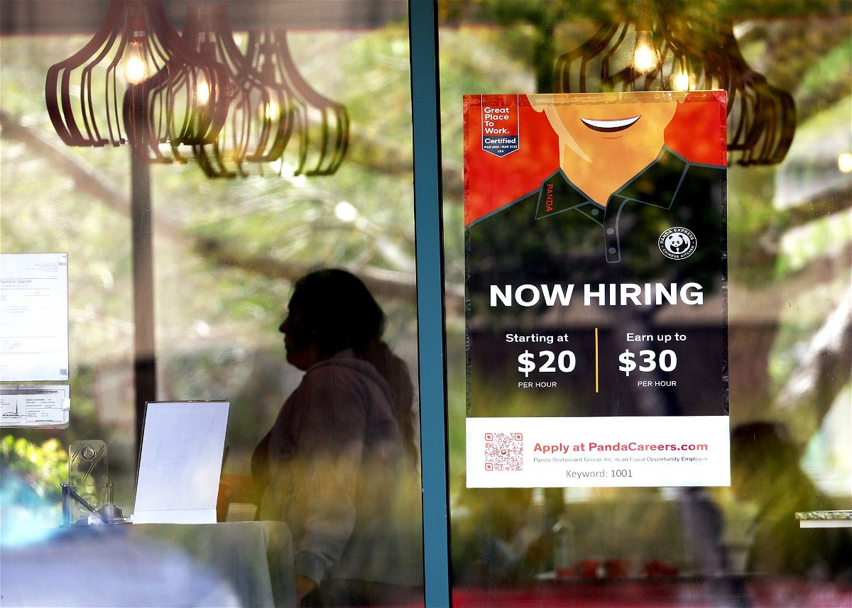 <i>Justin Sullivan/Getty Images</i><br/>A now hiring sign is posted at a Panda Express restaurant in August 2022 in Marin City