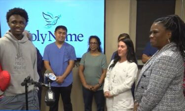 Kyle Hewlett reunited with the Holy Name Medical Center critical care team that saved his life with a marathon CPR session.