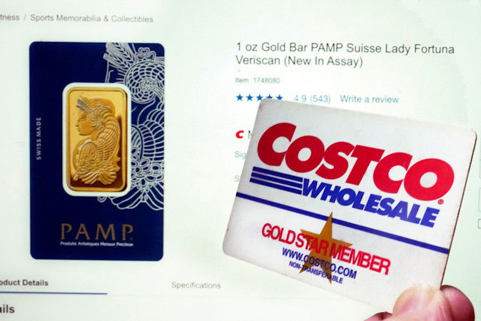 A Costco webpage featuring a one-ounce Gold Bar PAMP Suisse Lady Fortuna Veriscan, and a Costco membership card, are shown in this photo,