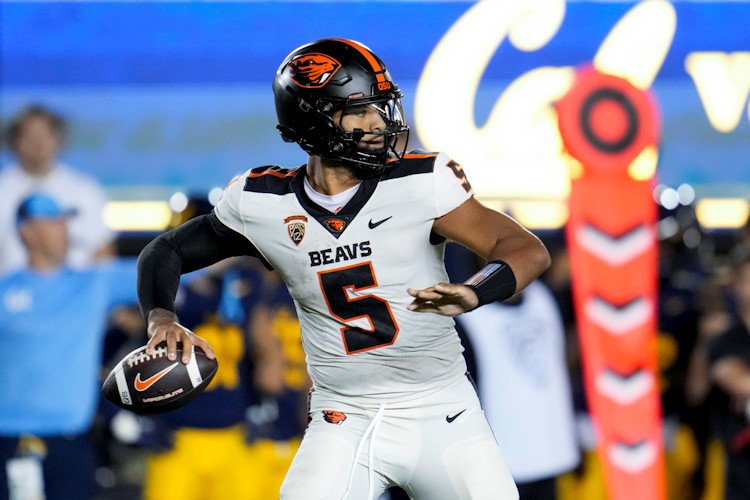Oregon State quarterback DJ Uiagalelei looks for a receiver during the second half of the team's game against California on Saturday