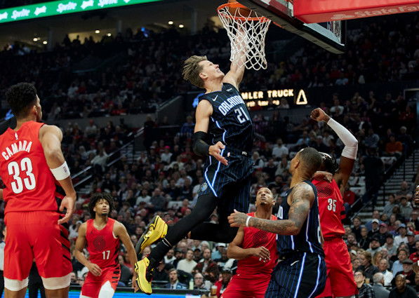Orlando Magic center Moritz Wagner (21) dunks against the Portland Trail Blazers during the first half of Friday night's NBA game in Portland