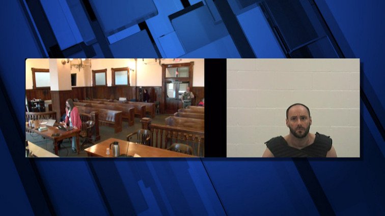 Russell Votruba  appeared in Crook County Circuit Judge Wade Whiting's court by video from county jail in May